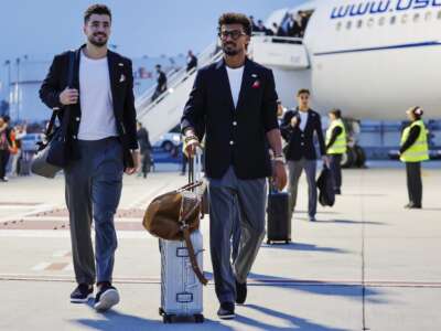 Members of the Iranian national soccer team arrive at Tijuana International Airport on June 7, 2026 in Tijuana, Mexico. The team's World Cup participation has been complicated by the Iran war, with the team now training in Tijuana, Mexico instead of Tucson, Arizona amid ongoing U.S. visa processing issues.