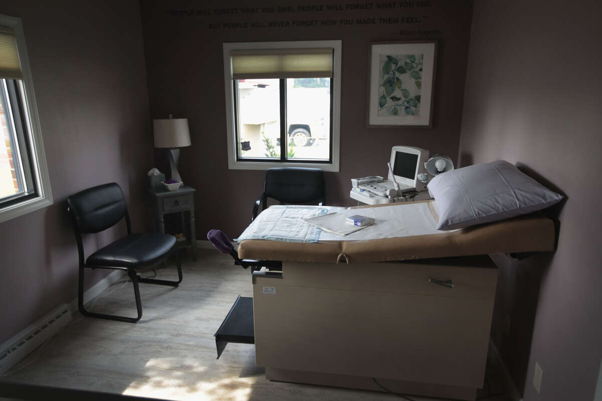 An ultrasound machine sits next to an exam table in an examination room at Whole Woman's Health of South Bend on June 19, 2019, in South Bend, Indiana. The clinic, which provided reproductive health care including providing abortions, closed its doors in June 2023 amid increasing abortion restrictions.