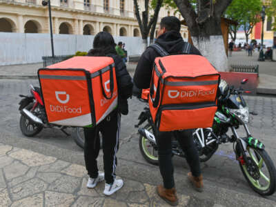 Didi Food delivery couriers seen on March 12, 2022, in San Cristobal de las Casas, Chiapas, Mexico.