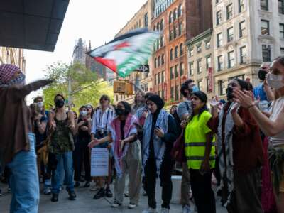 Pro-Palestinian protesters confront supporters of Israel outside The New School in lower Manhattan on May 2, 2024, in New York City.