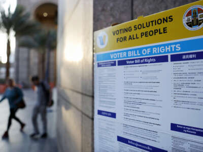 A voter bill of rights is posted outside a vote center during the in-person early voting period in California's Proposition 50 special election on October 27, 2025, in Los Angeles, California.