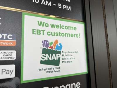 Sign at supermarket entrance with text reading We Welcome EBT customers and a SNAP logo in Lafayette, California, on November 13, 2025.
