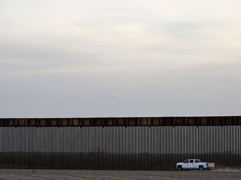A truck rides along the U.S.-Mexico border wall in Quemado, Texas, on February 18, 2026.
