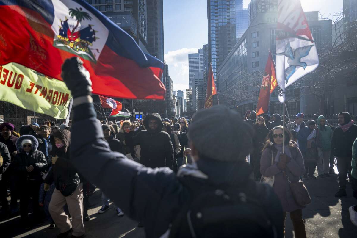 People march during a demonstration to denounce attacks on migrants and refugees on the International Day for the Elimination of Racial Discrimination in Montreal, Quebec, Canada, on March 21, 2026.