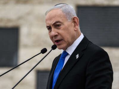 Israel's Prime Minister Benjamin Netanyahu speaks during a ceremony commemorating Israel's Remembrance Day for fallen soldiers, or Yom HaZikaron, at the Military Cemetery on Mount Herzl in Jerusalem, on April 21, 2026.