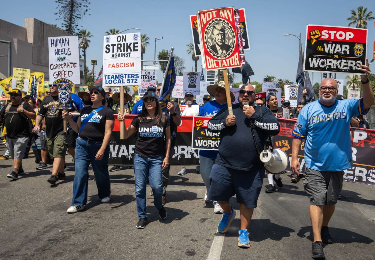 Teamsters march through downtown Los Angeles for a May Day rally on Friday, May 1, 2026.