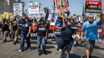 Teamsters march through downtown Los Angeles for a May Day rally on Friday, May 1, 2026.