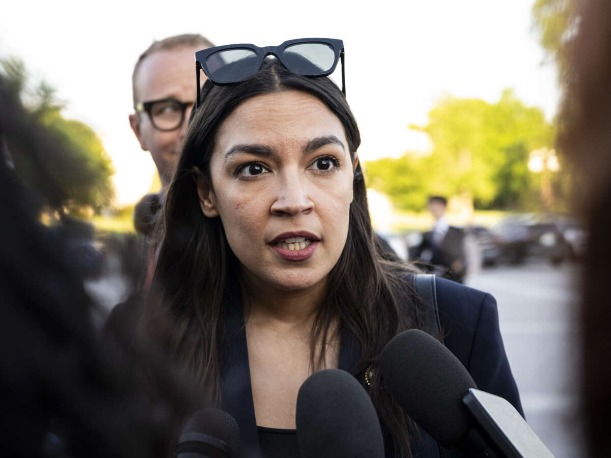 AOC Says Mike Johnson’s GOP Is “Running a Protection Racket” for Trump