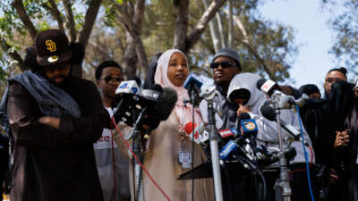 Hawaa Abdullah, the daughter of Amin Abdullah, the security guard who was shot and killed at the Islamic Center of San Diego, speaks during a press conference on the shooting at Lindbergh Park, near the mosque, in San Diego, California, on May 19, 2026.