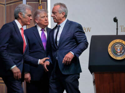 Centers for Medicare and Medicaid Services Administrator Mehmet Oz, President Donald Trump ,and Health and Human Services Secretary Robert F. Kennedy Jr. hold a news conference on May 18, 2026, in Washington, D.C.