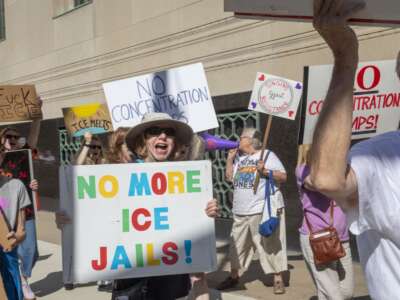 Protesters gather outside the federal courthouse in Detroit, Michigan, on May 18 2026, to protest ICE's plan to convert a warehouse in Romulus, Michigan, into an immigration jail.
