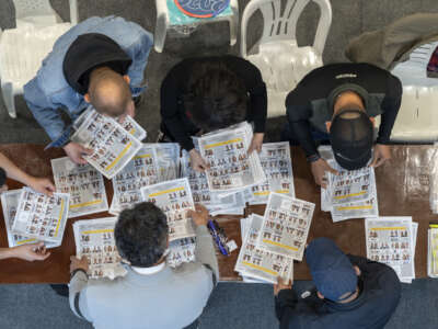 Election officials count the votes during the presidential election on May 31, 2026, in Bogota, Colombia.