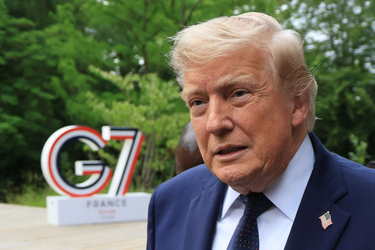 President Donald Trump arrives to attend a musical interlude before a gala dinner as part of the G7 summit, in Evian, France, on June 16, 2026.