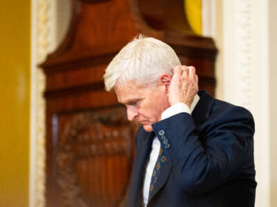 Sen. Bill Cassidy walks through the Ohio Clock Corridor before President Donald Trump arrives for the Senate Republicans' lunch meeting in the U.S. Capitol on June 24, 2026, in Washington, D.C.