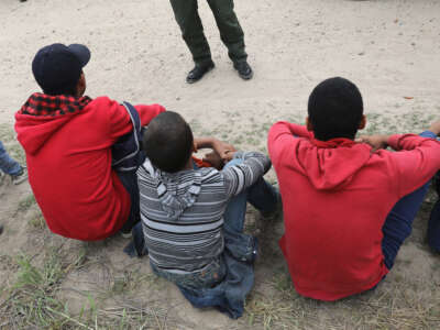 Border Patrol agents take Central American children into custody on January 4, 2017, near McAllen, Texas.