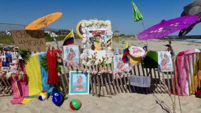 Artists display their work along the fence at Jacob Riis Beach on August 9, 2025, as part of the Miss Colombia Day celebration, an annual community event honoring the beloved LGBTQIA+ icon.