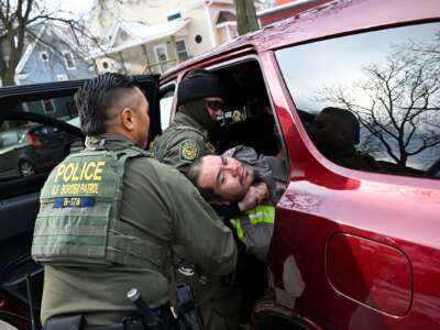 Border Patrol agents arrest an individual in Minneapolis, Minnesota on January 11, 2026, during "Operation Metro Surge" in Minnesota, and one week after ICE agents killed Renee Good.