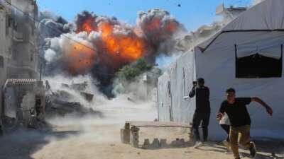 Smoke from an explosion can be seen after an Israeli attack on July 12, 2026 in Gaza City, Gaza.