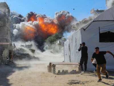 Smoke from an explosion can be seen after an Israeli attack on July 12, 2026 in Gaza City, Gaza.