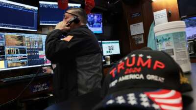 Traders work on the floor of the New York Stock Exchange during morning trading on April 13, 2026 in New York City. Stocks opened up lower after U.S. President Donald Trump ordered a U.S. blockade of the Strait of Hormuz following failed negotiations with Iran that sent oil prices back over $100 per barrel.