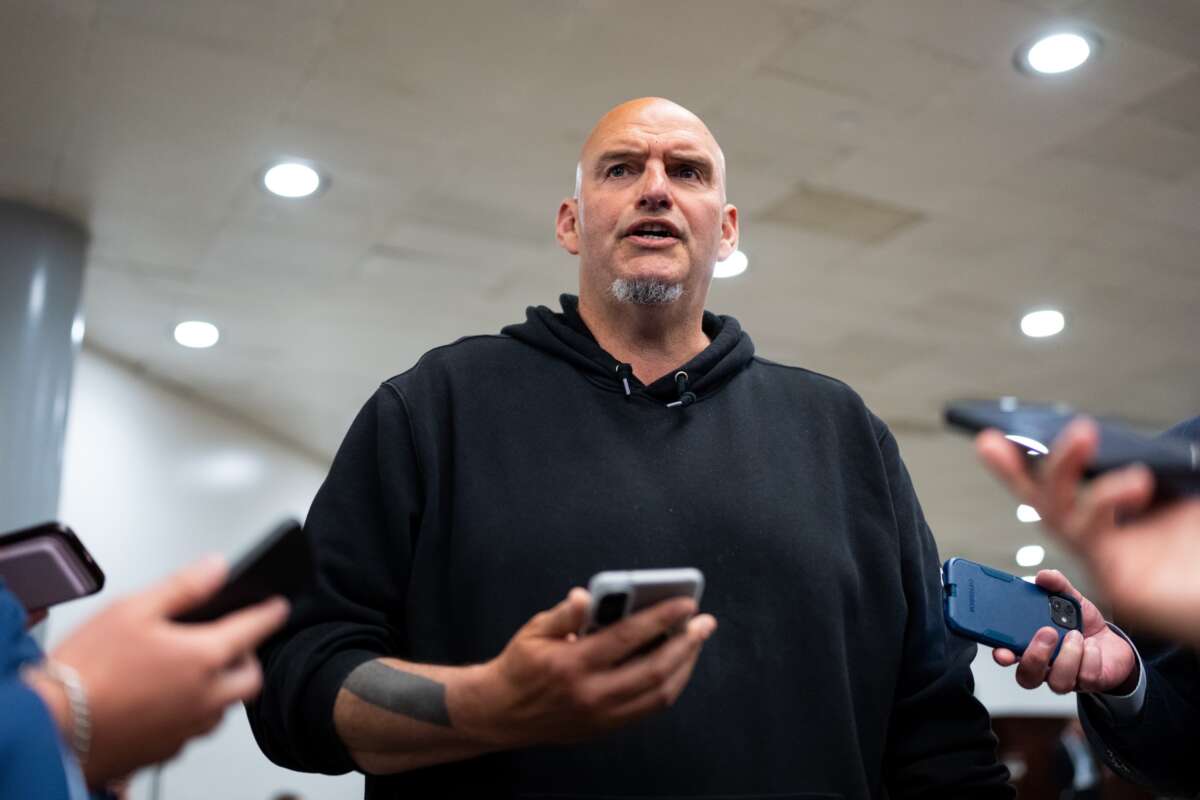 Sen. John Fetterman speaks to reporters in the Senate subway area in the U.S. Capitol on Tuesday, June 2, 2026.