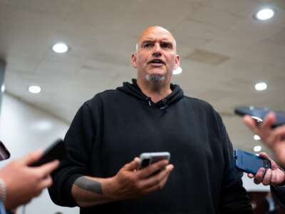 Sen. John Fetterman speaks to reporters in the Senate subway area in the U.S. Capitol on Tuesday, June 2, 2026.