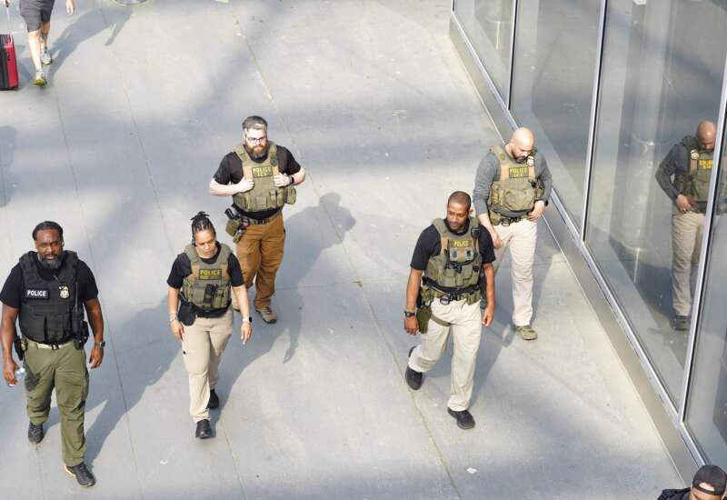 Immigration and Customs Enforcement (ICE) agents patrol Atlanta Hartsfield-Jackson International Airport on March 23, 2026 in Atlanta, Georgia.