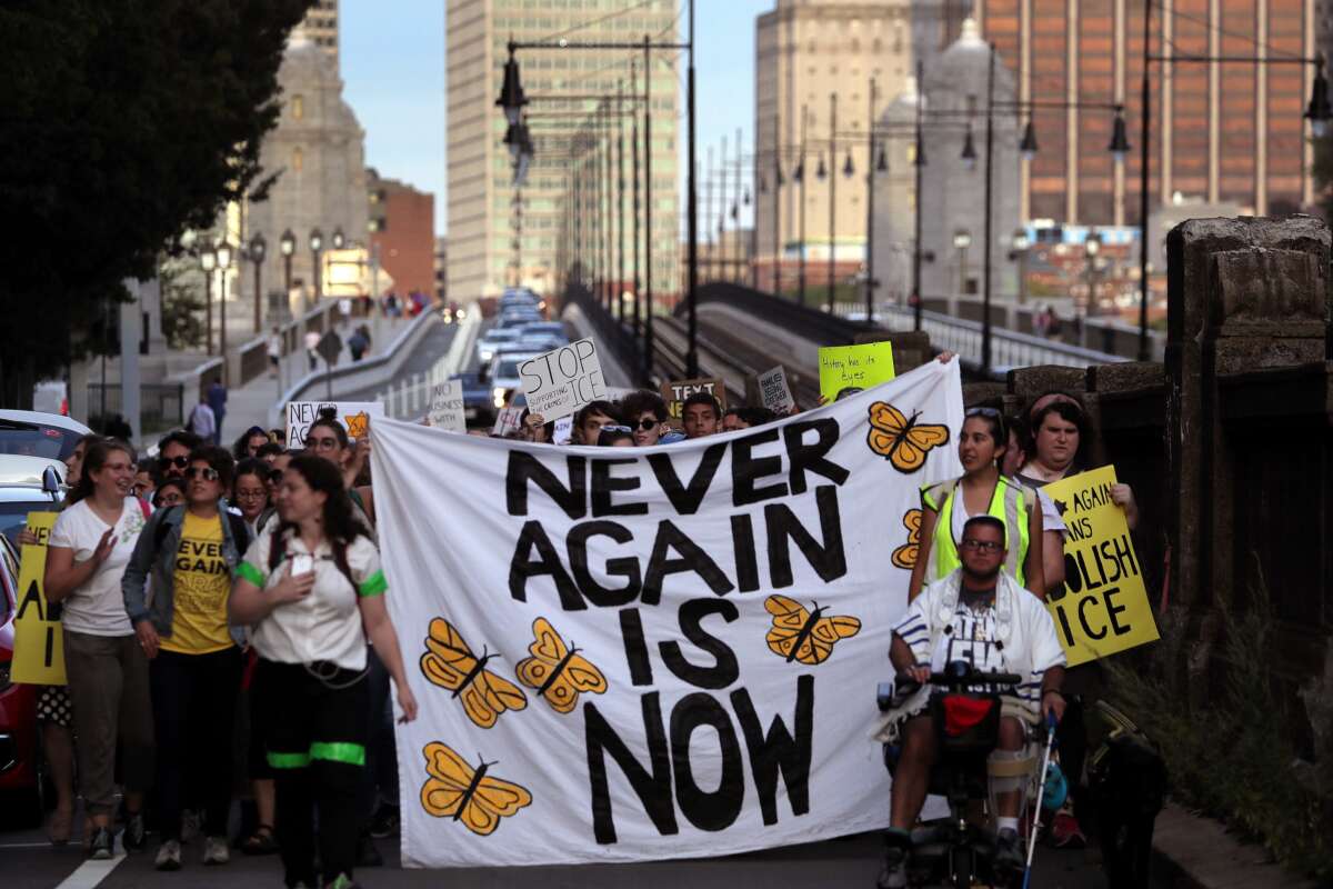 Anti-ICE protesters march across the Longfellow Bridge between Boston and Cambridge, Massachusetts, toward Amazon's Cambridge office after rallying at the New England Holocaust Memorial on September 5, 2019. The protest was planned by Never Again Action, a nationwide group of Jewish activists that formed to protest private companies doing business with ICE.