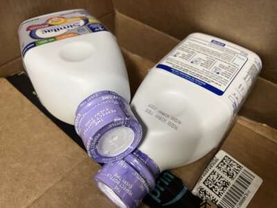 Bottles of Similac baby formula from Abbott Laboratories are visible in a shipment box, in Lafayette, California, on May 13, 2022.