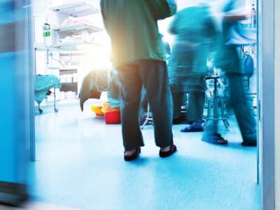 Surgeons operating in hospital