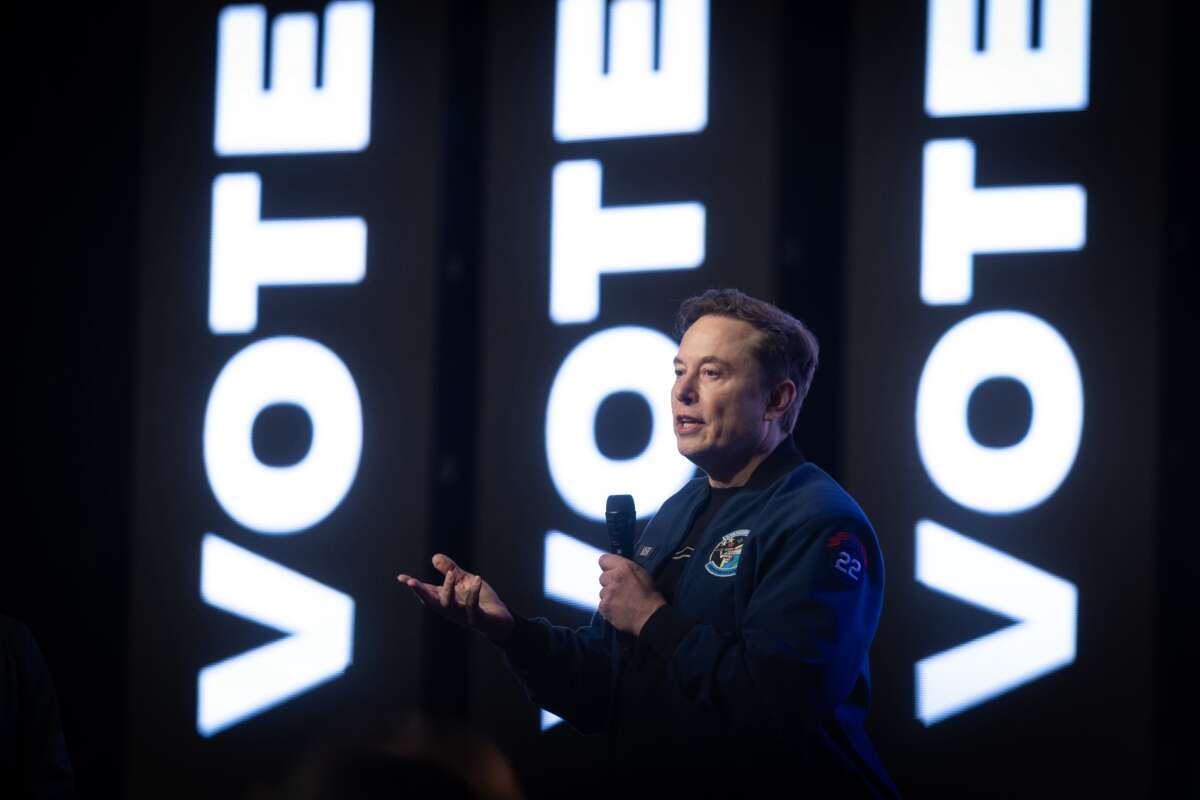 Elon Musk speaks during a town hall meeting at the KI Convention Center in Green Bay, Wisconsin, on March 30, 2025.