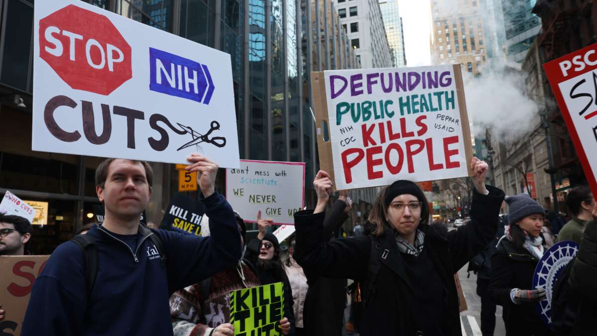 Protesters rally to demand an end to DOGE’s and the Trump administration’s cuts to funding for science, research, education, and other areas, on April 8, 2025, in New York City.