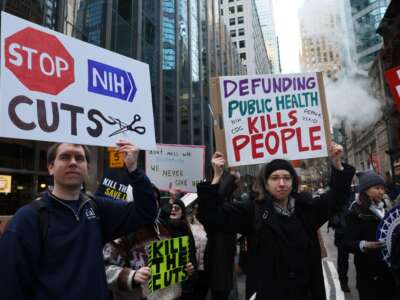Protesters rally to demand an end to DOGE’s and the Trump administration’s cuts to funding for science, research, education, and other areas, on April 8, 2025, in New York City.