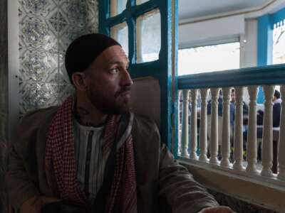 James "Fergie" Chambers sits in a cafe in Tunis, Tunisia, on February 8, 2024.