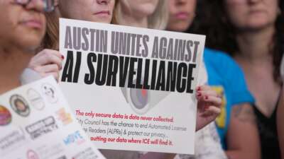Activists speak out against automated license plate readers during a press conference at city hall on June 4, 2025, in Austin, Texas.