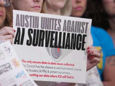 Activists speak out against automated license plate readers during a press conference at city hall on June 4, 2025, in Austin, Texas.