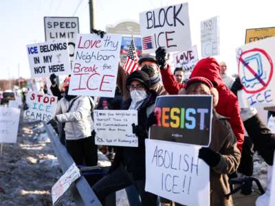 People protest against the planned project of converting a warehouse into an ICE jail in Roxbury, New Jersey, on February 16, 2026.