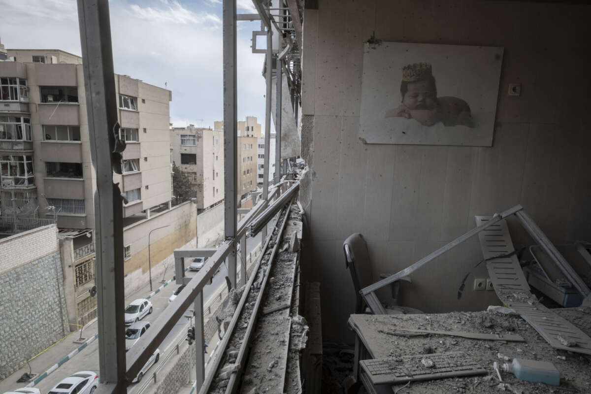 An image of a newborn baby is photographed at the Gandhi Hospital, which is damaged after U.S.-Israeli strikes on a state TV telecommunication tower nearby in Tehran, Iran, on March 2, 2026.