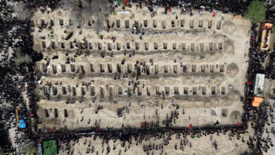 Bodies of children are carried to their graves during a funeral held on March 3, 2026, in Minab, Iran, for students killed in the U.S.-Israeli strike on an elementary school in Minab on February 28, 2026.
