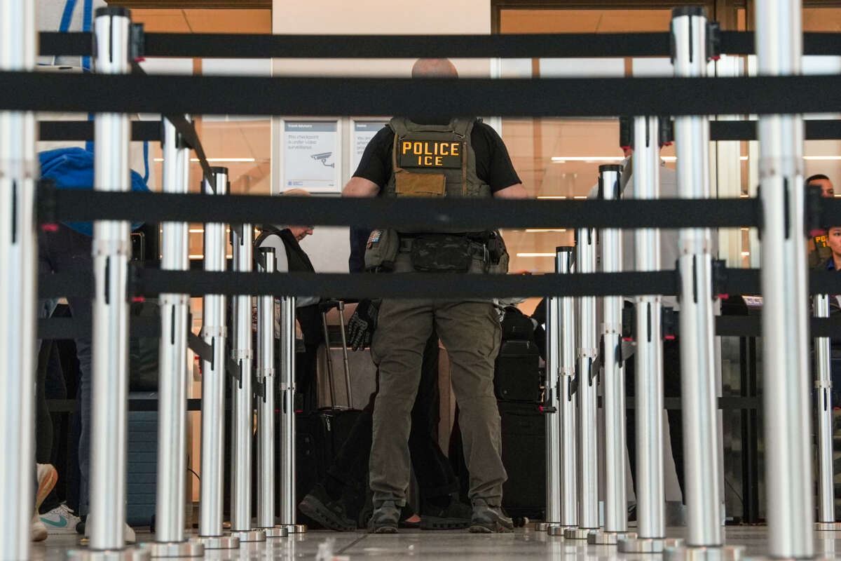 An ICE agent “assists” TSA agents at a security checkpoint in LaGuardia Airport, on March 28, 2026, in New York, New York.