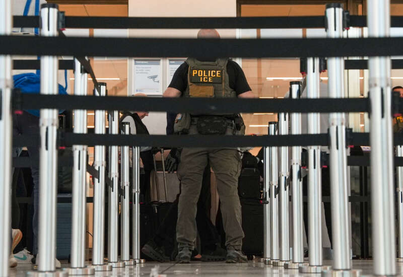 An ICE agent “assists” TSA agents at a security checkpoint in LaGuardia Airport, on March 28, 2026, in New York, New York.