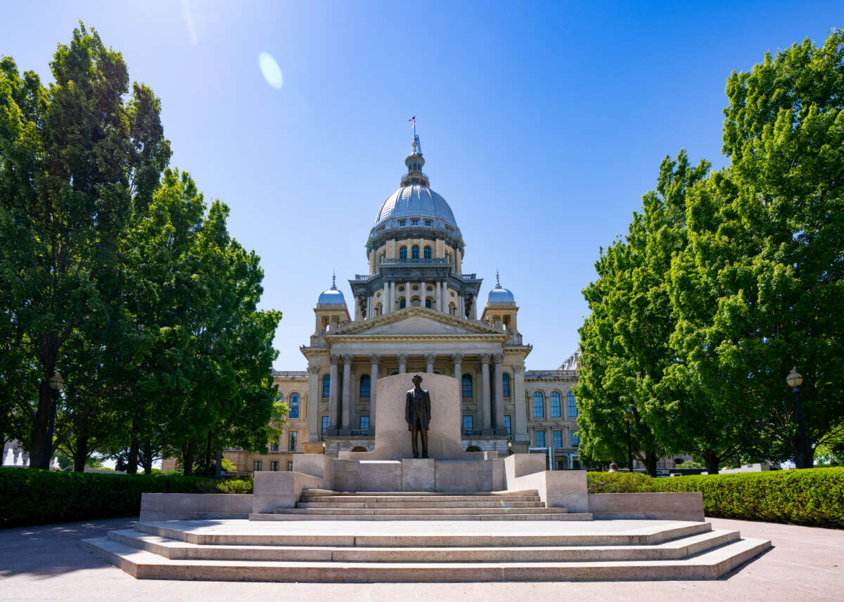 General views of the Illinois State Capitol Building, featuring a statue of Abraham Lincoln at the steps leading to the entrance of the capitol on May 11, 2026, in Springfield, Illinois.