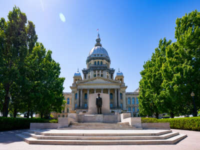 General views of the Illinois State Capitol Building, featuring a statue of Abraham Lincoln at the steps leading to the entrance of the capitol on May 11, 2026, in Springfield, Illinois.