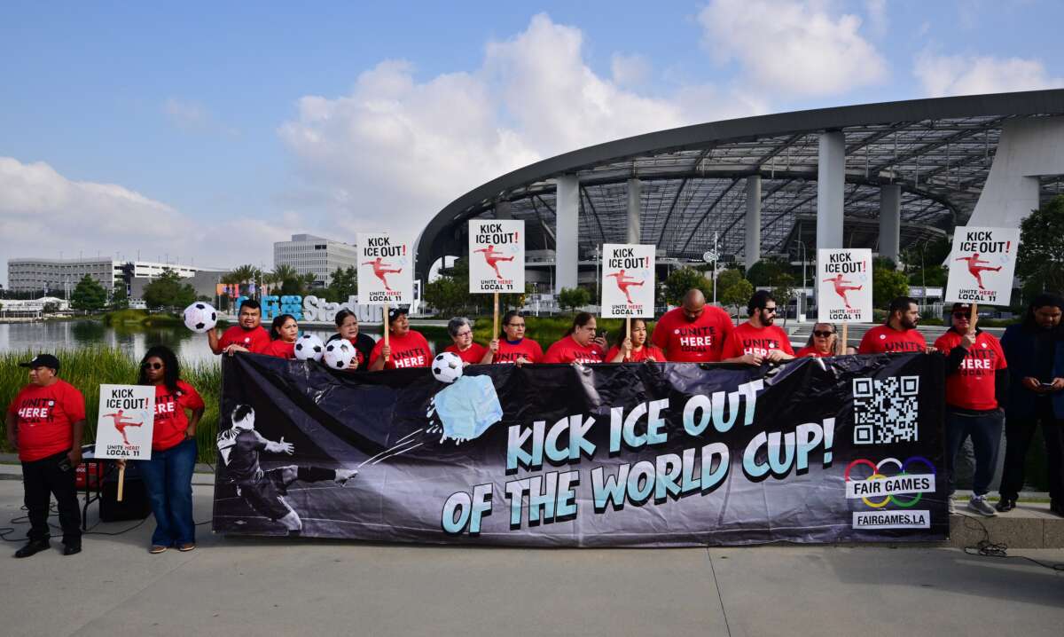 Sofi Stadium workers -- including cooks, bartenders, dishwashers, servers, and cashiers -- protest outside the stadium ahead of the 2026 FIFA World Cup in Inglewood, California, on May 18, 2026. Members of UNITE HERE Local 11 are fighting to keep ICE out of their workplace during the World Cup.