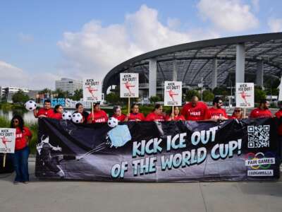 Sofi Stadium workers -- including cooks, bartenders, dishwashers, servers, and cashiers -- protest outside the stadium ahead of the 2026 FIFA World Cup in Inglewood, California, on May 18, 2026. Members of UNITE HERE Local 11 are fighting to keep ICE out of their workplace during the World Cup.