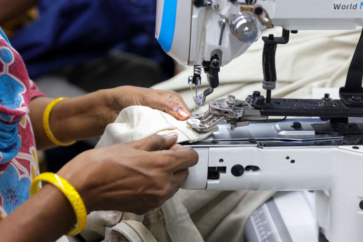 A woman uses a sewing and stitching machine in Kolkata, India, on June 11, 2026.