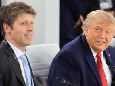 Open AI CEO Sam Altman and President Donald Trump react during a working lunch meeting of G7 members, partner countries, and artificial intelligence business leaders as part of the G7 summit, in Evian, eastern France, on June 17, 2026.
