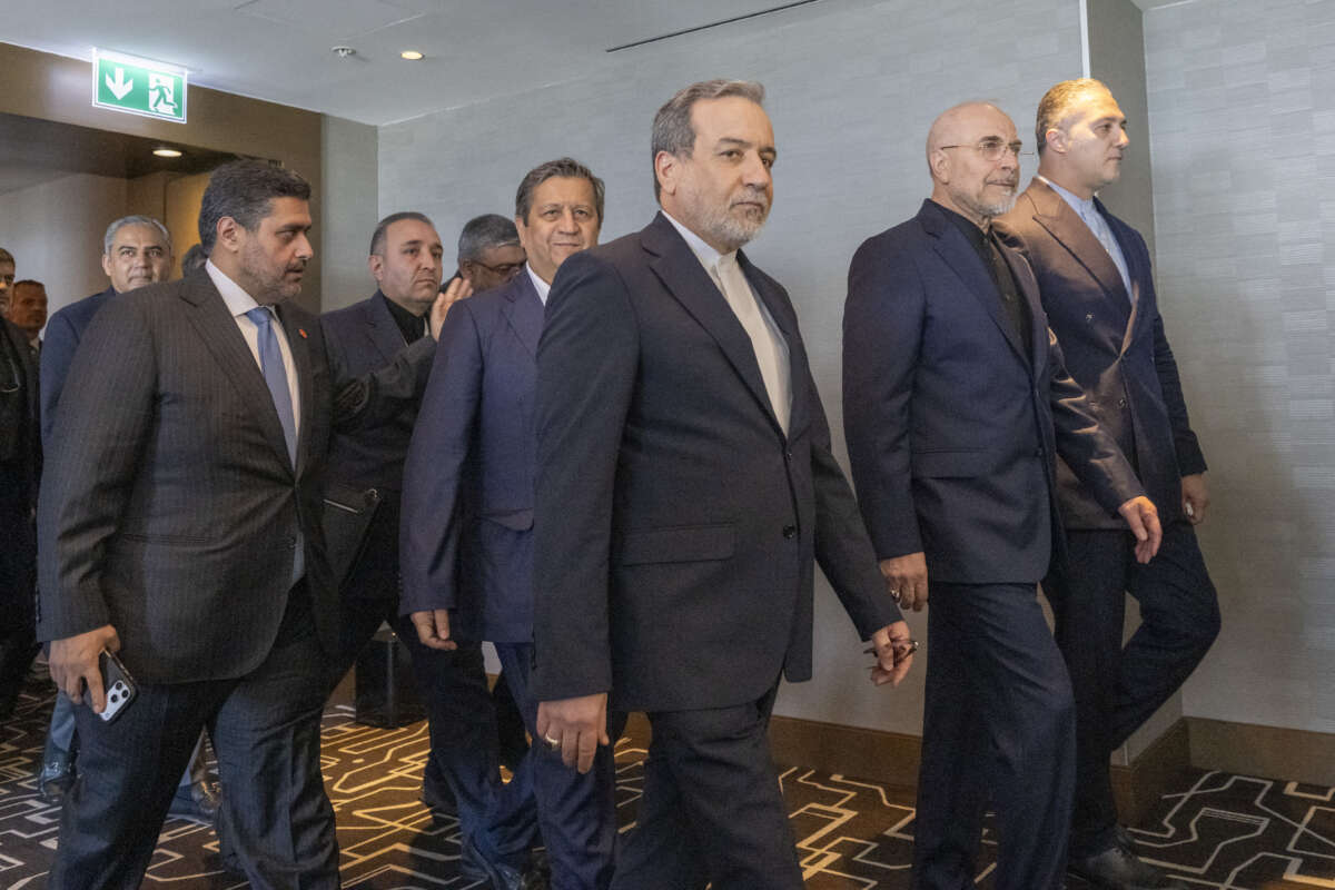 Iran's delegation including Minister of Foreign Affairs of Iran Abbas Araghchi (C) and Speaker of the Islamic Parliament of Iran, Mohammed Bagher Ghalibaf (2ndR) arrive for a quadrilateral meeting between the United States, Iran, Pakistan, and Qatar at the Burgenstock luxury hotel complex near Lake Lucerne, Switzerland, on June 21, 2026, as part of talks aimed at advancing a deal to end the Middle East conflict.