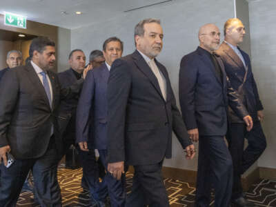 Iran's delegation including Minister of Foreign Affairs of Iran Abbas Araghchi (C) and Speaker of the Islamic Parliament of Iran, Mohammed Bagher Ghalibaf (2ndR) arrive for a quadrilateral meeting between the United States, Iran, Pakistan, and Qatar at the Burgenstock luxury hotel complex near Lake Lucerne, Switzerland, on June 21, 2026, as part of talks aimed at advancing a deal to end the Middle East conflict.