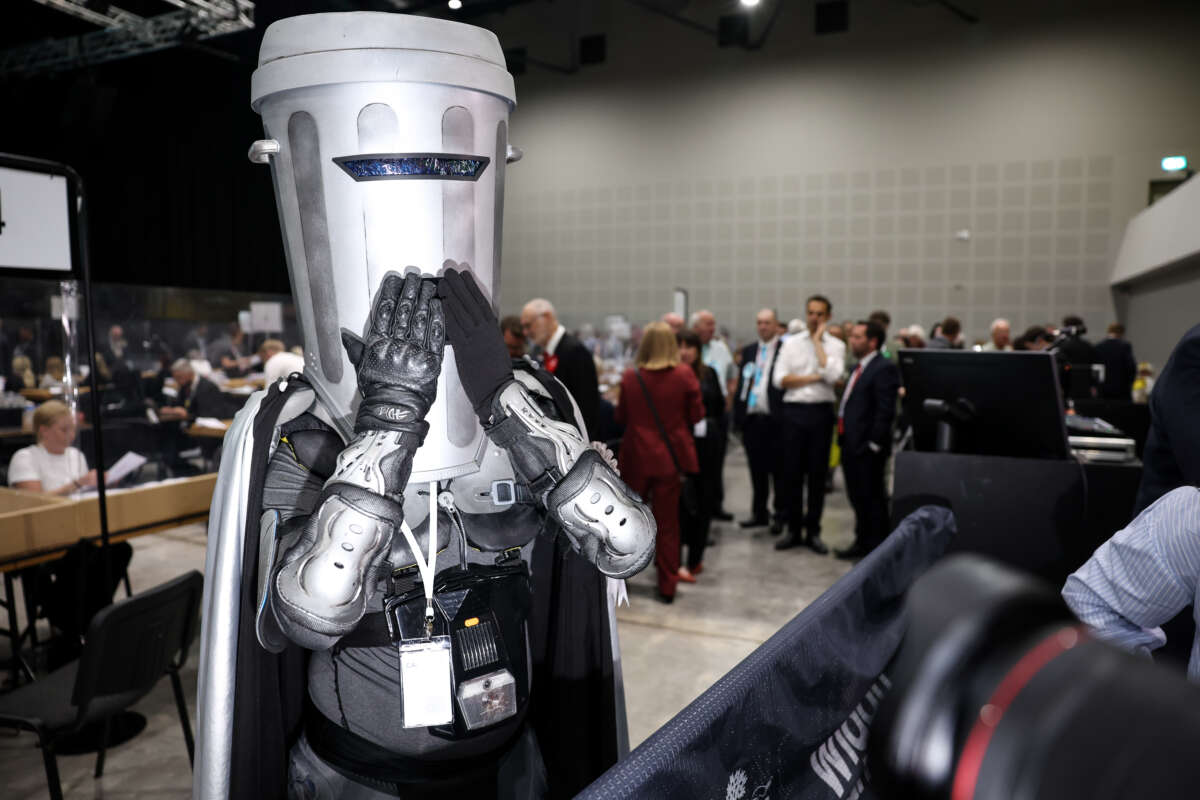 Count Binface of the Count Binface Party speaks to the media at the by-election declaration at The Edge where votes were being counted on June 19, 2026, in Wigan, England.